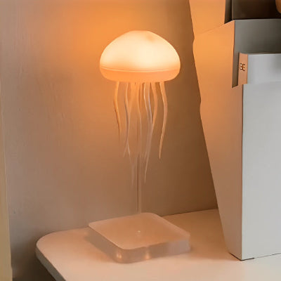 lampe de chevet méduse sur meuble à livre
